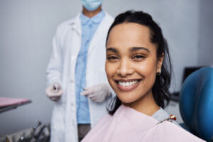 young woman smiling after teeth whitening