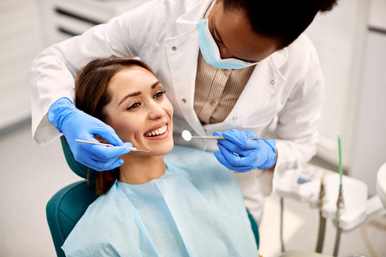 Young Woman Smiling during Dentistry
