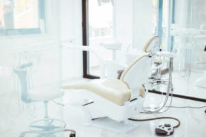 Dentistry, medicine, medical equipment and stomatology concept - interior of new modern dental clinic office with chair. Interior of the office of patients reception with dental equipment in the dental clinic.