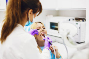 Blonde woman in dentist office