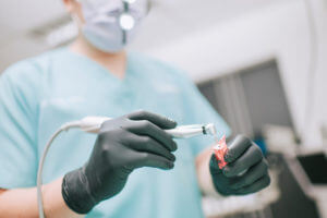dentist preparing Dental prosthetist tool implant