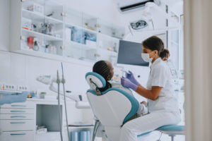 Dentist examining a patient in a modern dental clinic