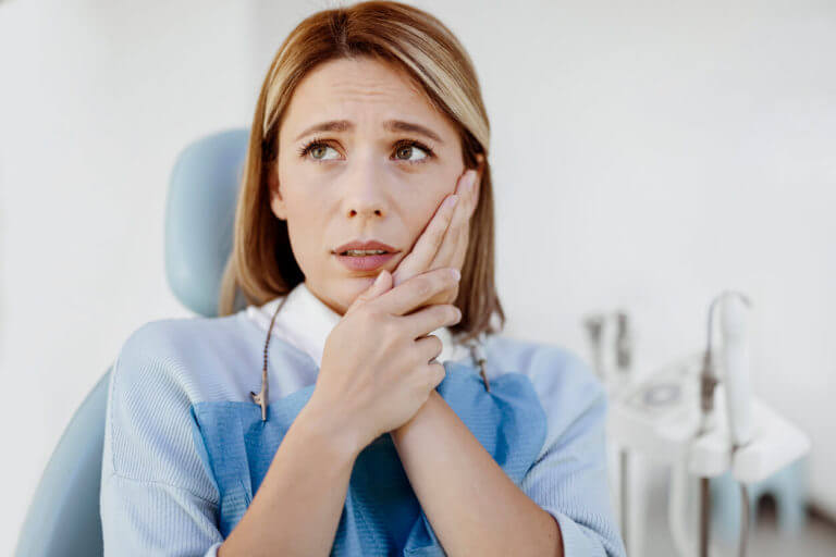 woman at the dentist has gum disease