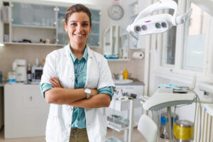 Image of a female dentist at her dental clinic.